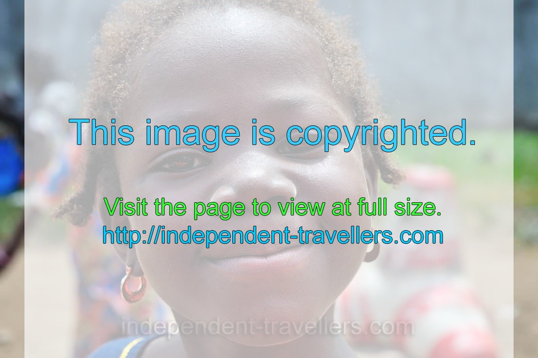 Wide open smile is on the face of little Ivorian girl