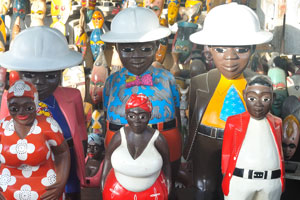 Funny dolls are dressed in the clothes of red-white colours