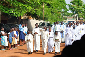 The festive procession is in the Cathedral of St. John the Baptist in Korhogo