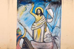 One of the fence paintings of the Cathedral of St. John the Baptist depicts Jesus in the boat