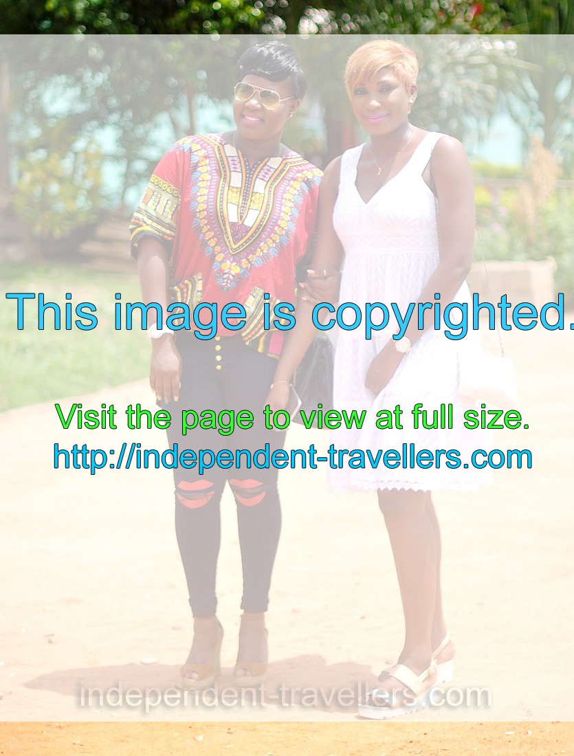 Two lovely Ivorian women wear enjoyable clothes