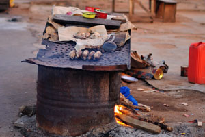 Traces of cooking are on the street in N'zuessi district