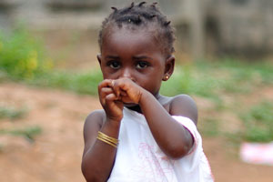 Cute little Ivorian girl has lost her slipper somewhere