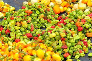 Tiny peppers are for sale at the market of Le Marché de Mô Faitai