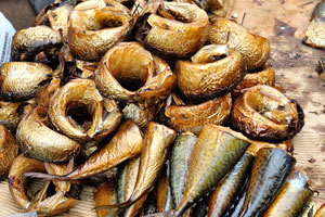 Smoked fish are for sale at the market of Le Marché de Mô Faitai