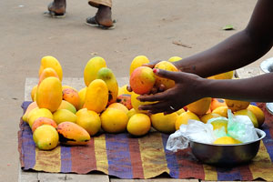 Tasty mangoes are for sale at the market of Le Marché de Mô Faitai