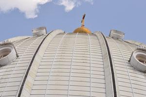 The main dome of Basilica of Our Lady of Peace is adorned with the cross of golden color