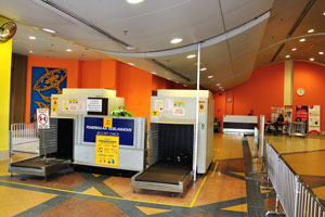 Place of security check where your luggage will be scanned