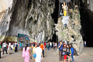 Batu caves attract around 5,000 visitors a day who come to climb the grueling 272 steps up to the caverns