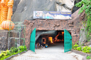 Gates to the Ramayana cave is painted with green color