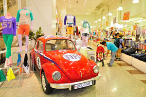 Toy car “2002 NR” is presented as a decoration inside one of the shops