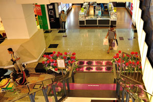 Glass floor inside Berjaya Times Square shopping complex is filled with funny pink liquid