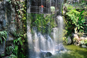 Sunny man-made waterfall