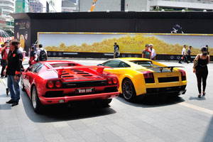 Red and yellow Lamborghini cars in front of Pavilion Mall