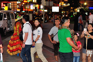 Tourists at the intersection of Jalan Bukit Bintang and Jalan Sultan Ismail streets