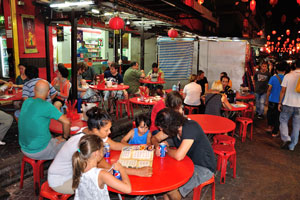 At night, Chinatown's main market area transforms into a lively and vibrant night market