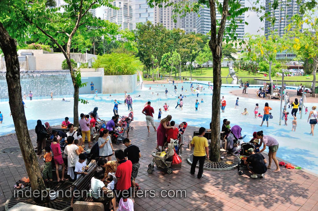 A children's playground with a public pool is located on the west side of the park
