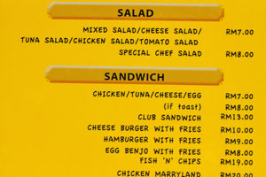 Abdul's Chalets menu: salad, sandwich, spaghetti and steak