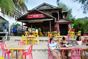 B'First accommodation and cafe is located on the Teluk Dalam beach