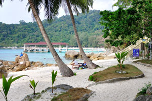 View of the pier at Perhentian Island Resort from the westernmost side of the PIR beach
