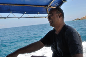 Driver of our motorboat likes to joke, he asked us not only to find fish and corals but also to find MH370