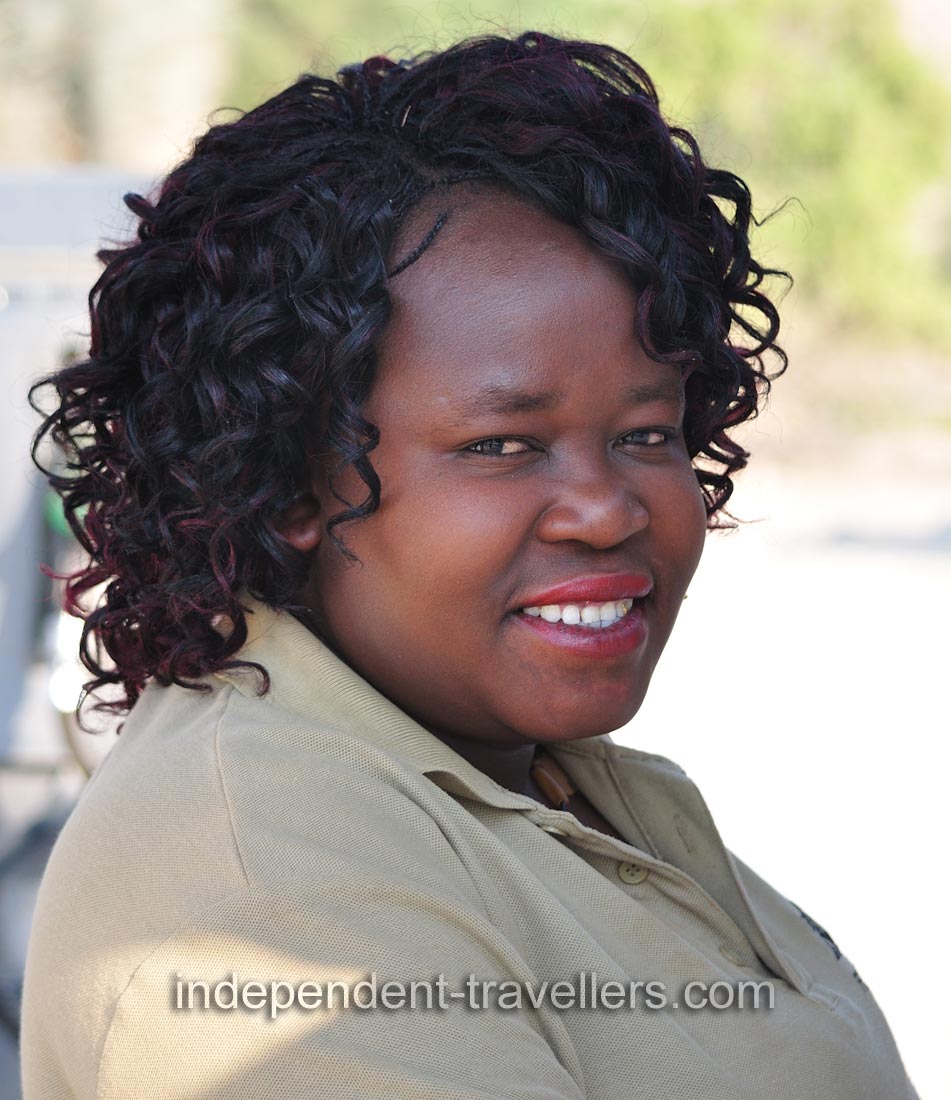 This lovely Namibian woman works at the gas station in Sesfontein