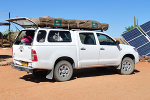 The tent was screwed tightly on the roof of jeep Toyota Hilux 4x4 while we stopped at Farm Gunsbewys