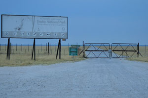 The road advertisement board at King Nehale Gate reads: “A friendly welcome to Etosha National Park”
