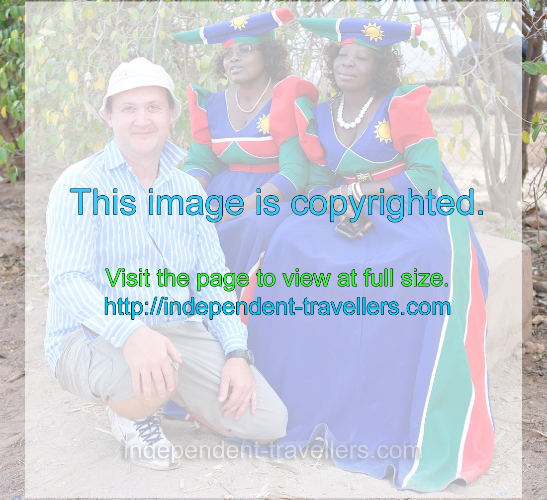 It is me and Herero women dressed in the national clothing with the colours of the Namibian flag