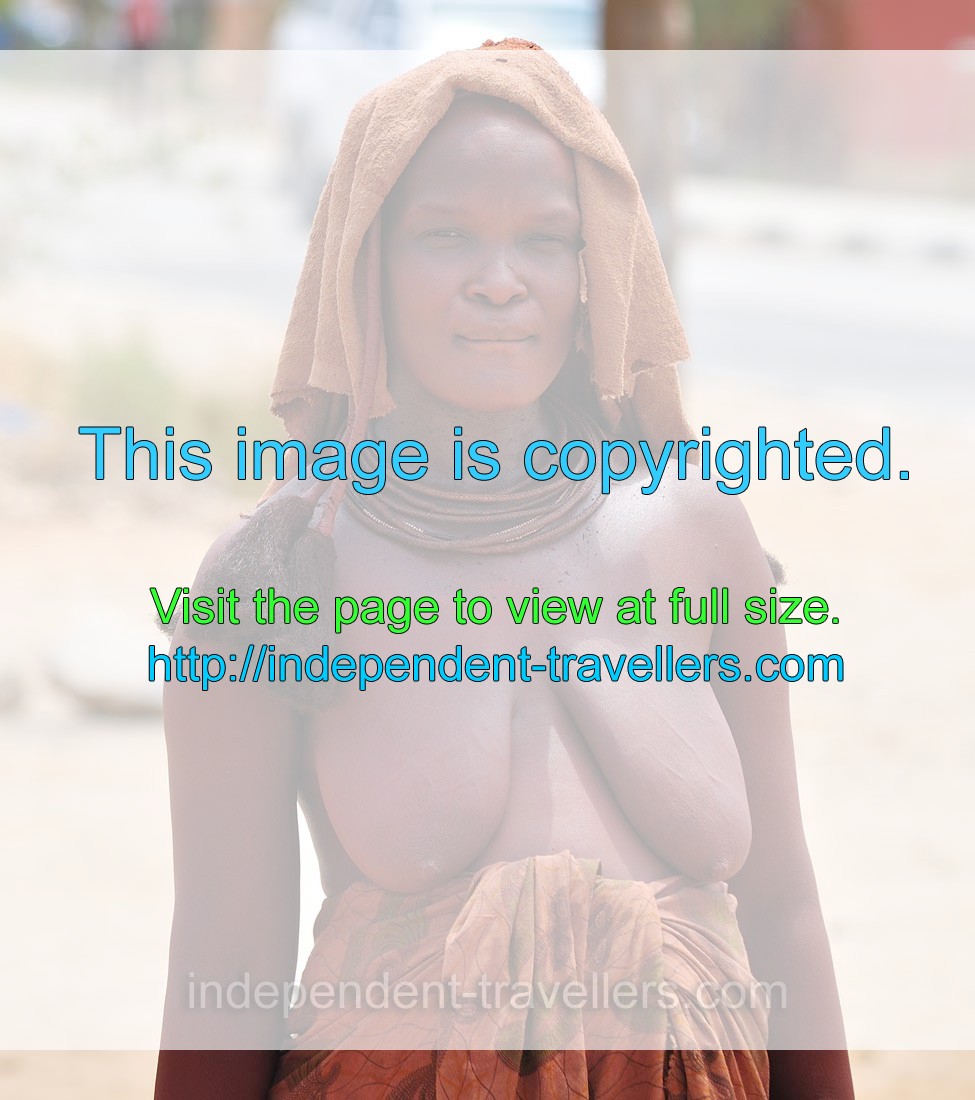 This Himba woman posed for me while we waited the escort of the President of Namibia