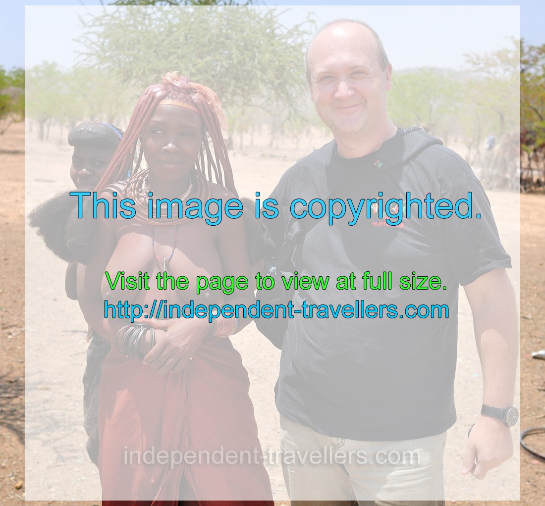 It is me smiling with the beautiful Himba woman
