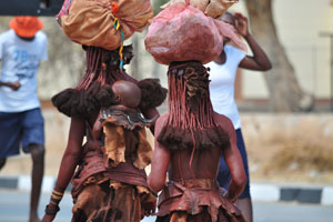 Herero women carry their luggage on the heads