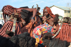 Himba women are in the truck near the Opuwo State Hospital