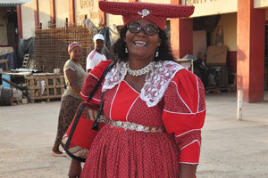 A Herero woman is smiling