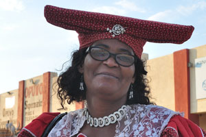 A Herero woman is dressed in the national clothing
