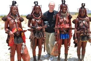 Young and lovely Himba girls are standing with me