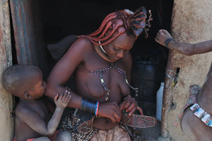 A Himba woman dresses up in national clothes
