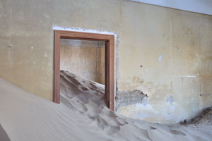 Kolmanskop is popular with photographers for its settings of the desert sands reclaiming this once-thriving town