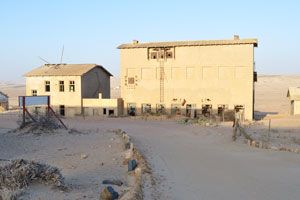 The fine desert sands are blown through the town, working their way into the abandoned houses of Kolmanskop