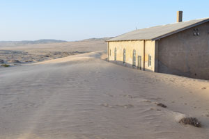 100 years after Kolmanskop peaked as a thriving and bustling oasis, it is now a dilapidated ghost town slowly being reclaimed by the sand