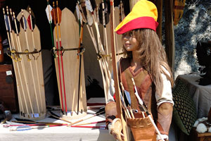A huge female archer doll is on the “Medieval Days” festival