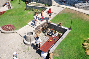 The medieval outdoor kitchen as seen from top of the wall of Guaita fortress