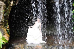 Bride is behind the waterfall