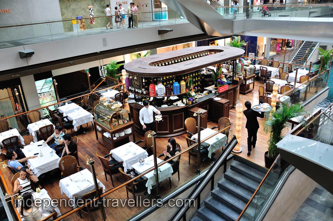 Cafe inside Marina Bay Sands which sat on a boat-inspired structure, suspended above the water canal