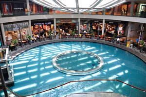 Rain Oculus above the Marina Bay Sands shopping mall canal