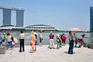 Tourists on the Merlion statue viewing platform