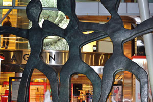 Sculptures with the shape of a man at the front of Paragon Shopping Centre