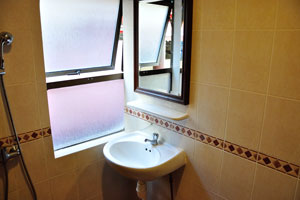 Bathroom of the room 12 in the South East Asia Hotel