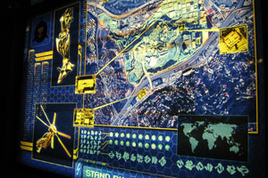 A series of signs and video screens are located within the Nonbiological Extraterrestrial Species Treaty base area