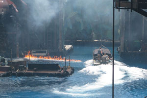 Waterworld - marine boat drives through the flame